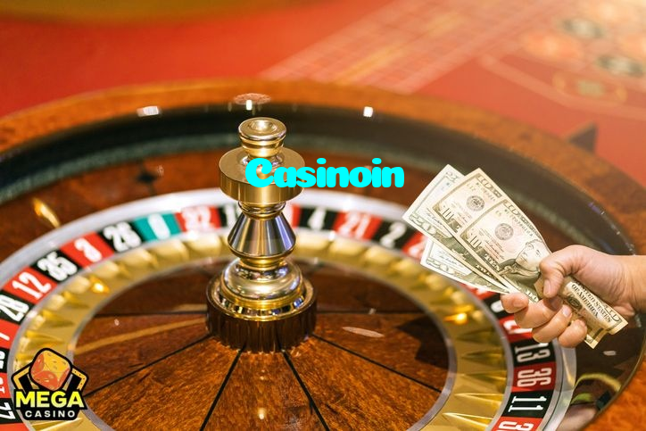 Casinoin casino presented on mobile device in Pakistan with slots and live games